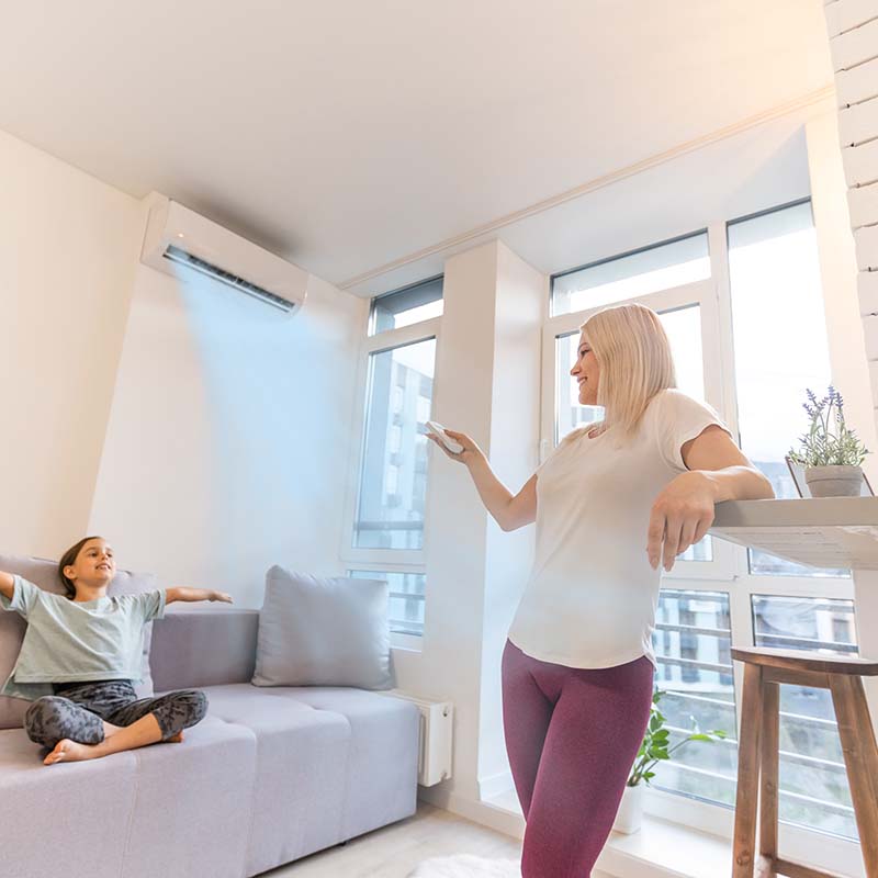 Woman Enjoying Mini-Split AC Installation at Rhode Island Home